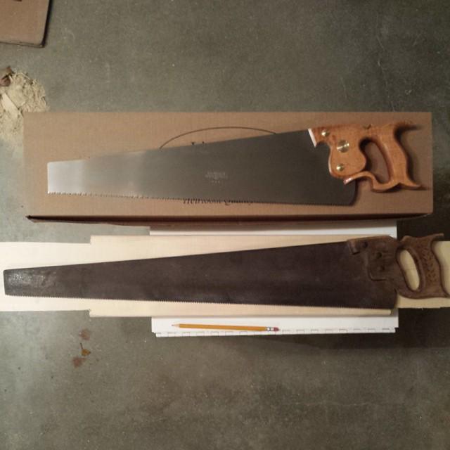 two hand saws: one new and one old